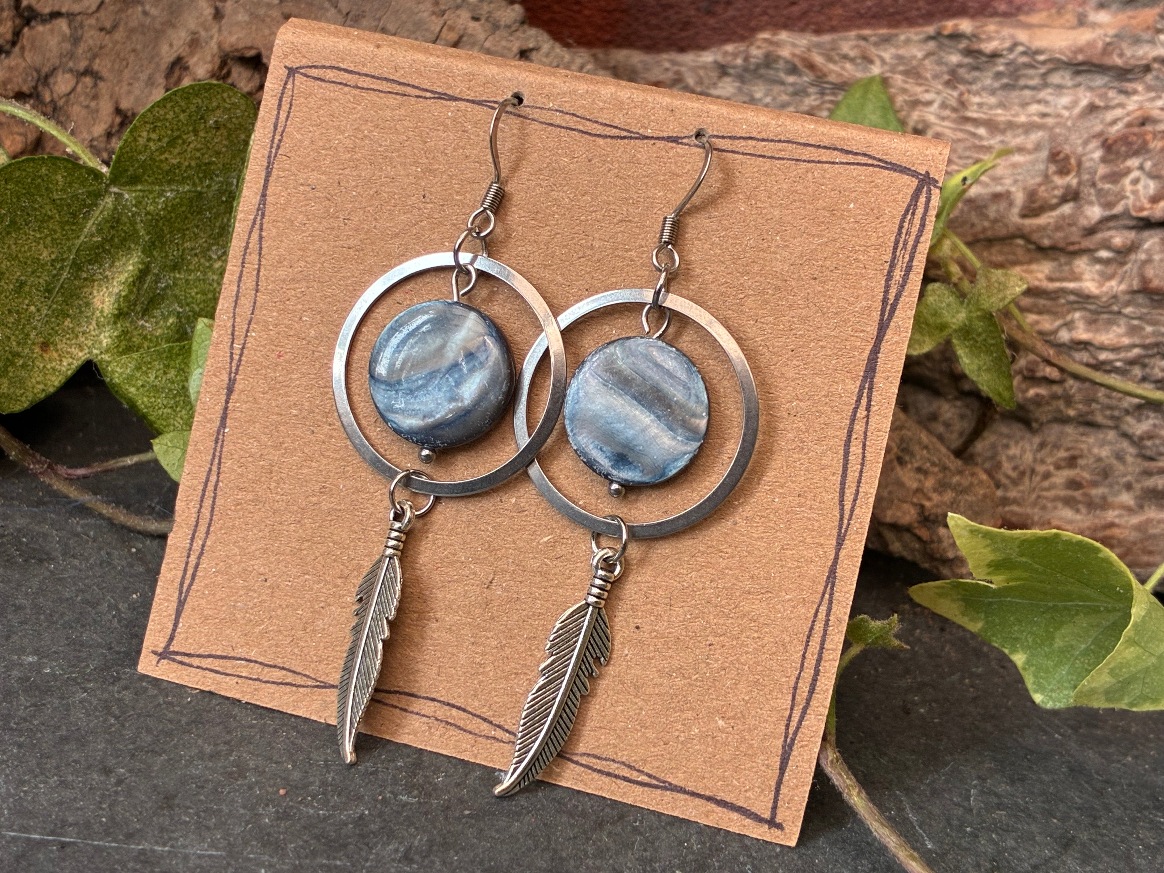 Blue beaded feather earrings