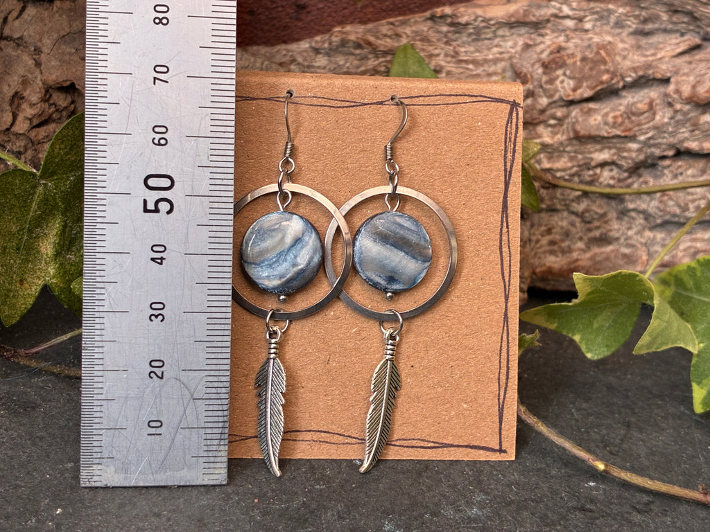 Blue beaded feather earrings