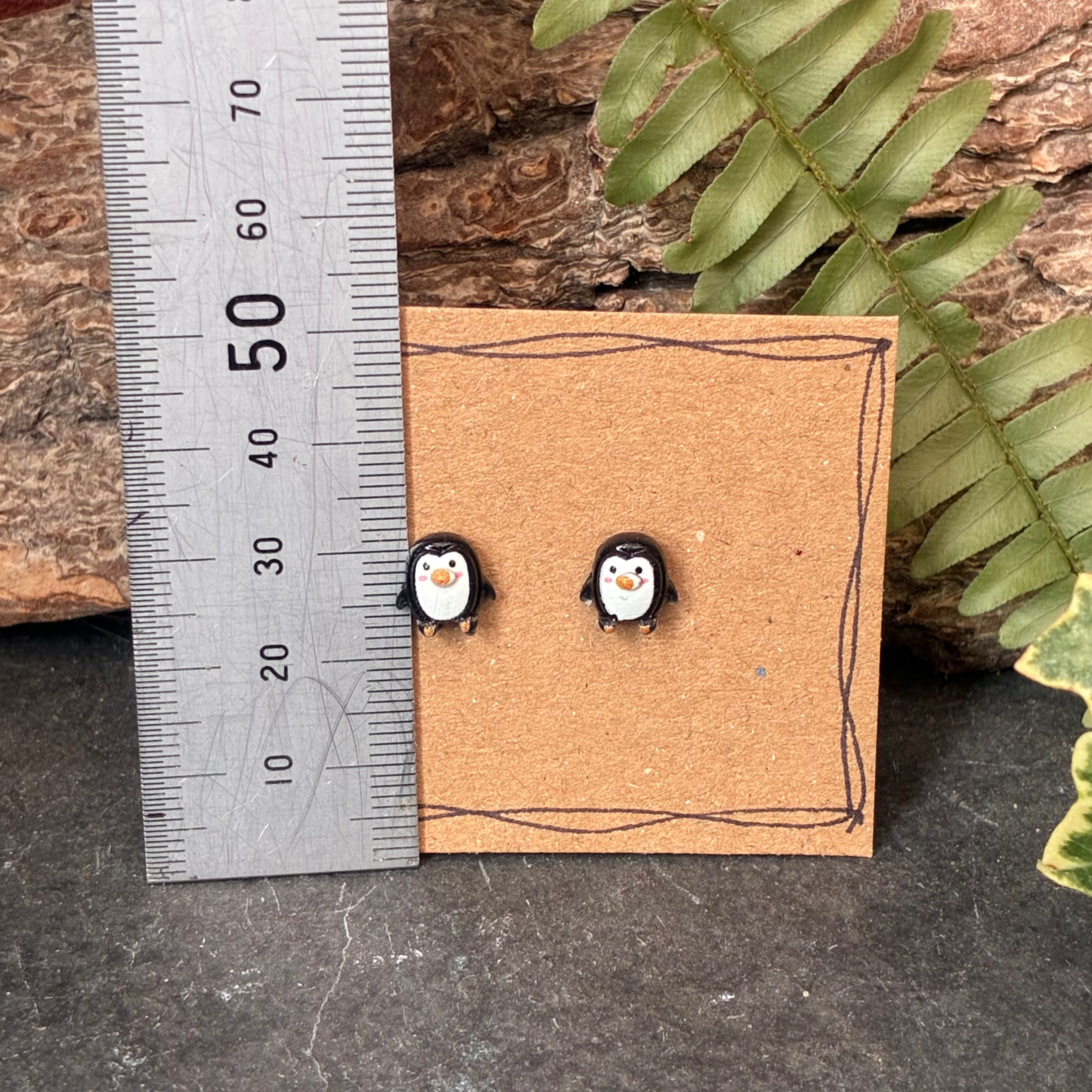 Penguin stud earrings