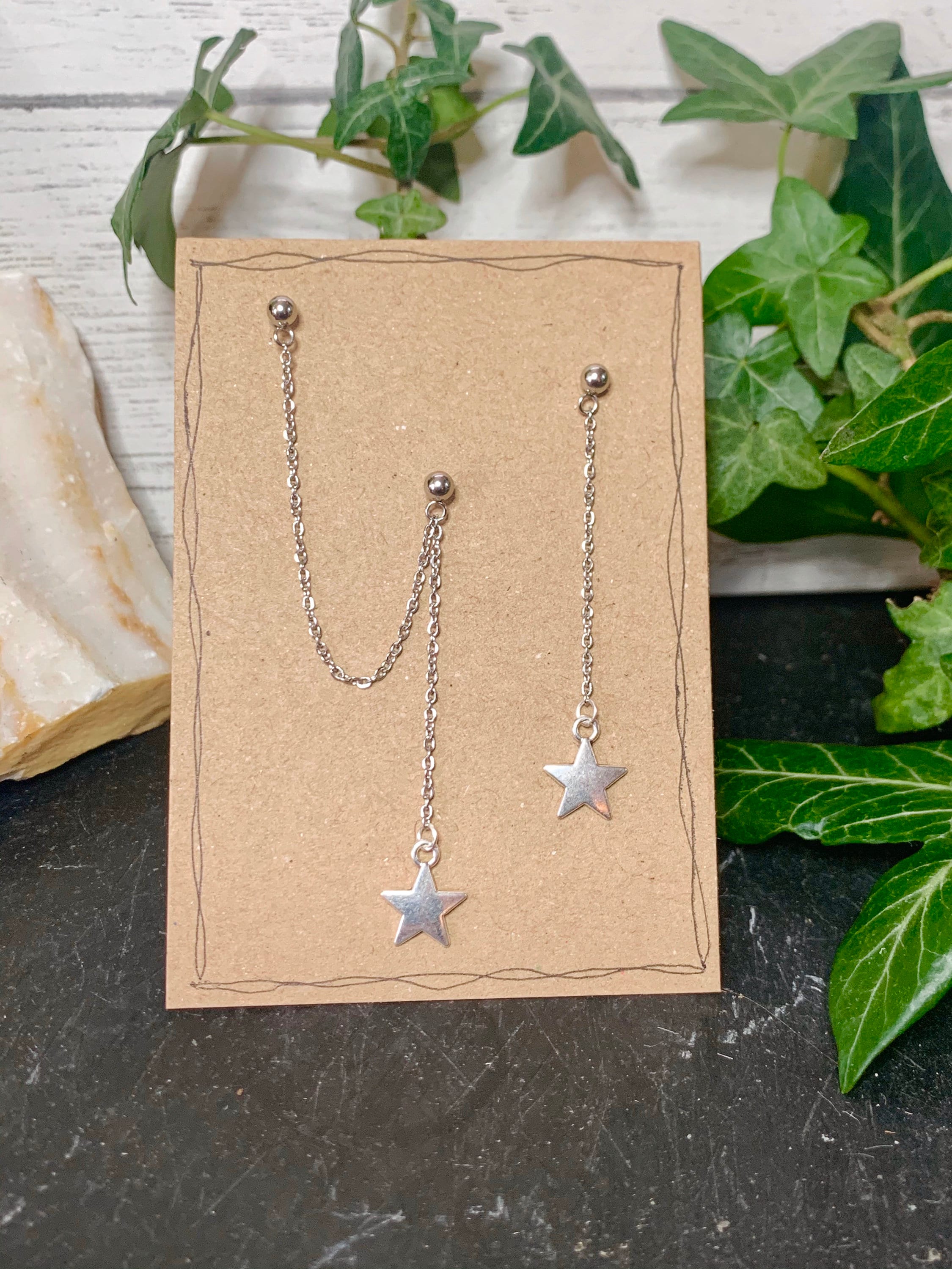 Helix earring. cartilage to lobe earring. Star earrings. skull earrings. spike earrings