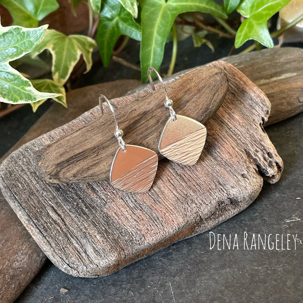 Sterling silver textured earrings.