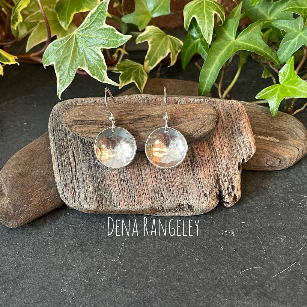Sterling silver textured earrings.