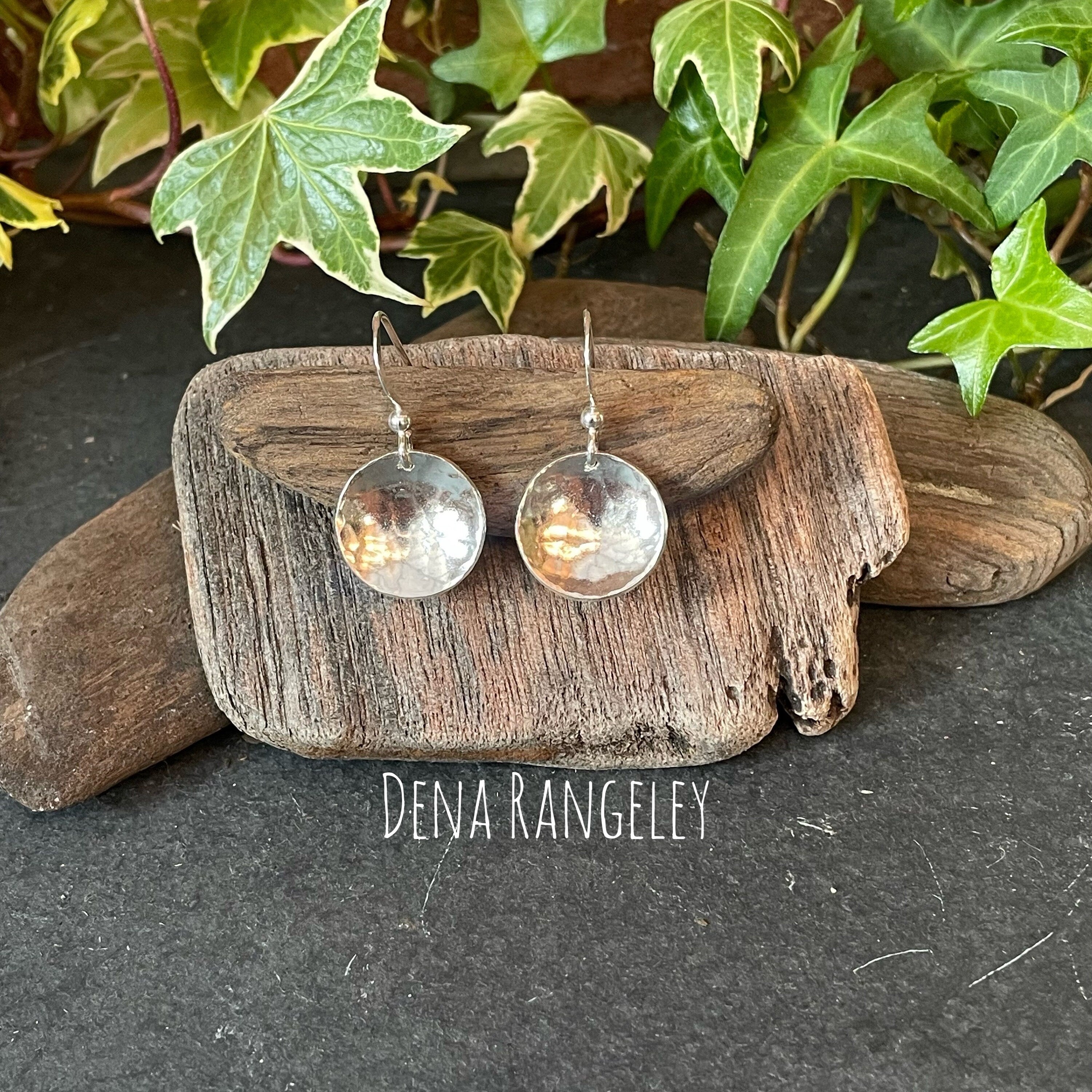 Sterling silver textured earrings.
