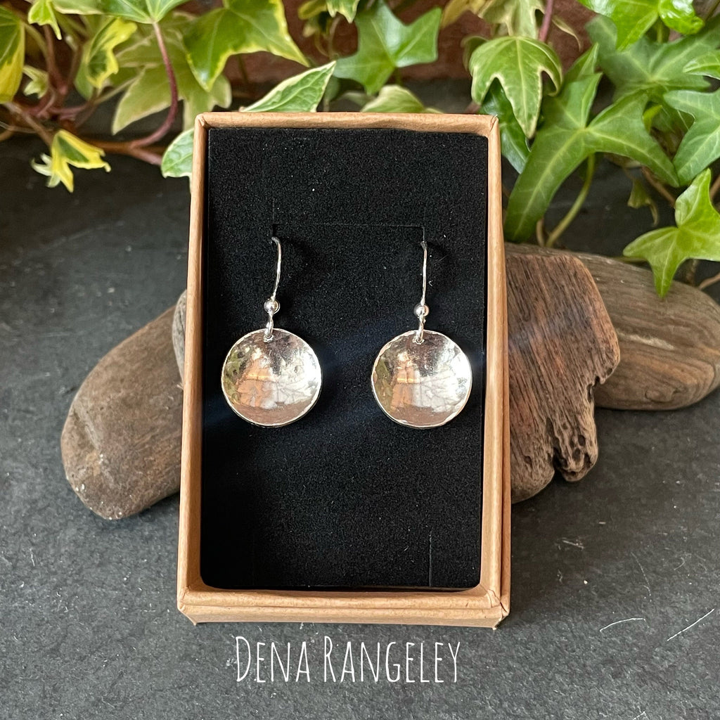 Sterling silver textured earrings.