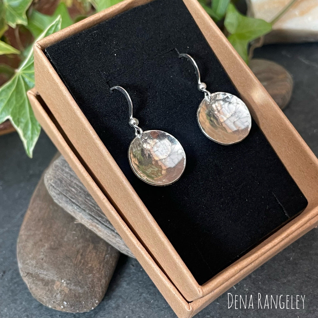 Sterling silver textured earrings.