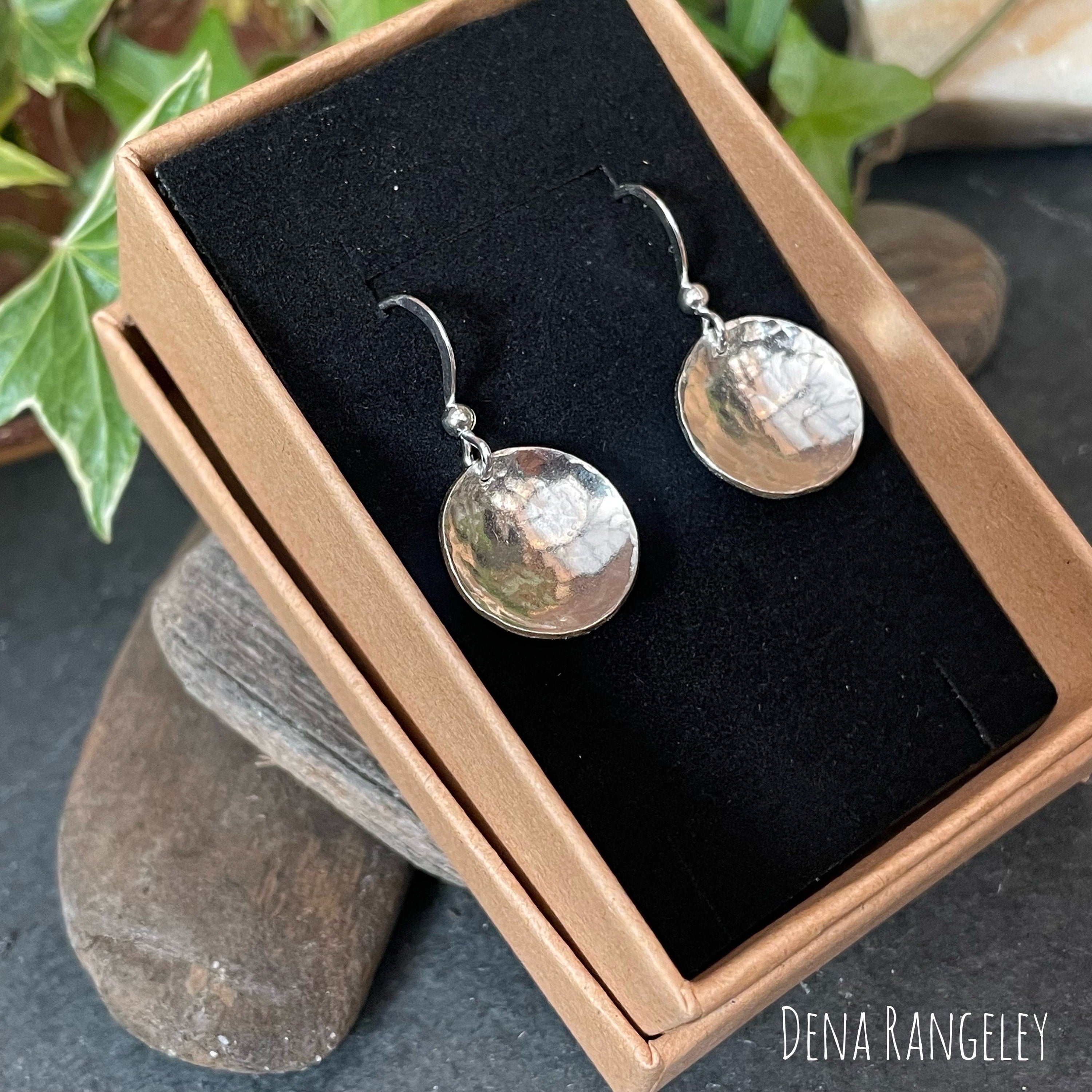 Sterling silver textured earrings.