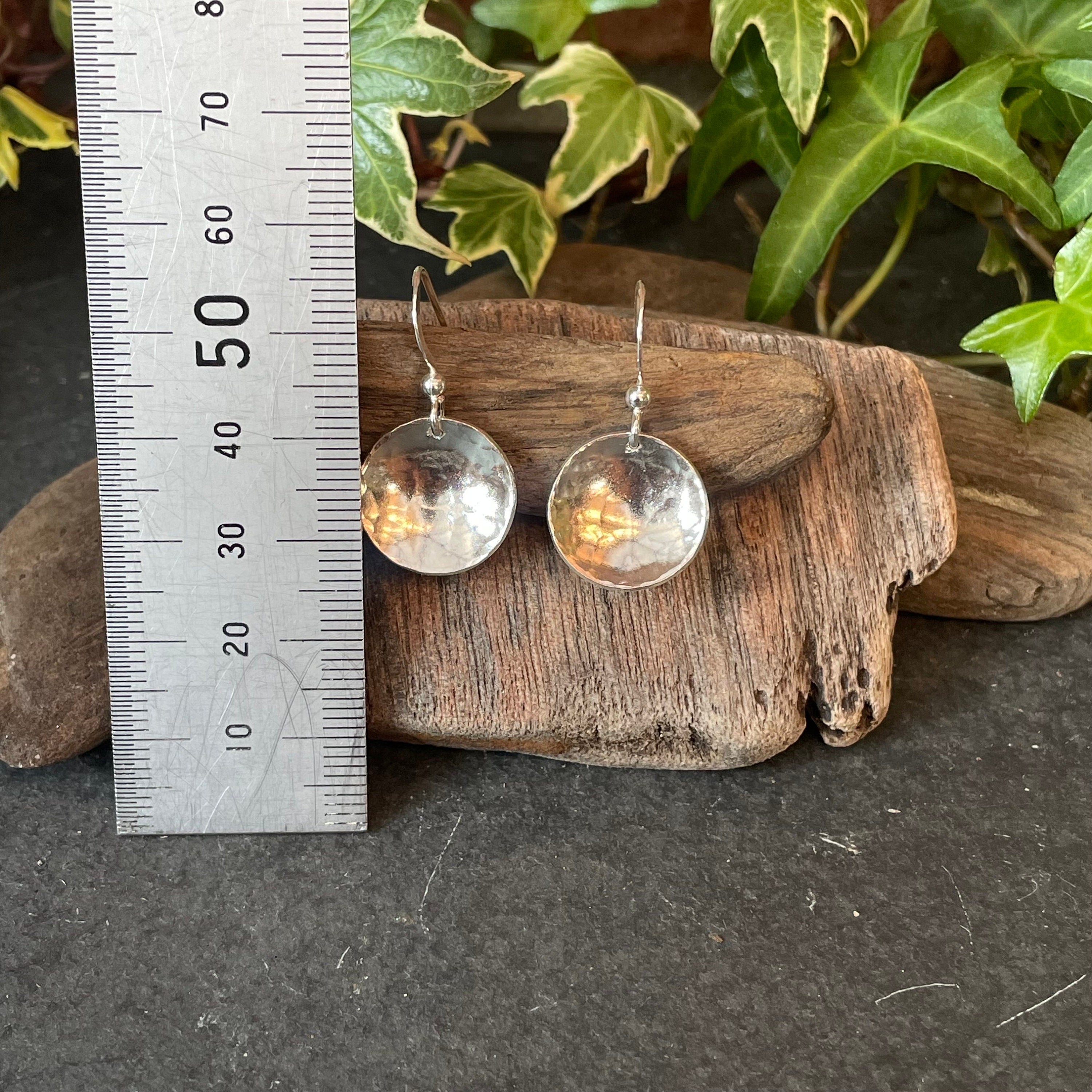 Sterling silver textured earrings.