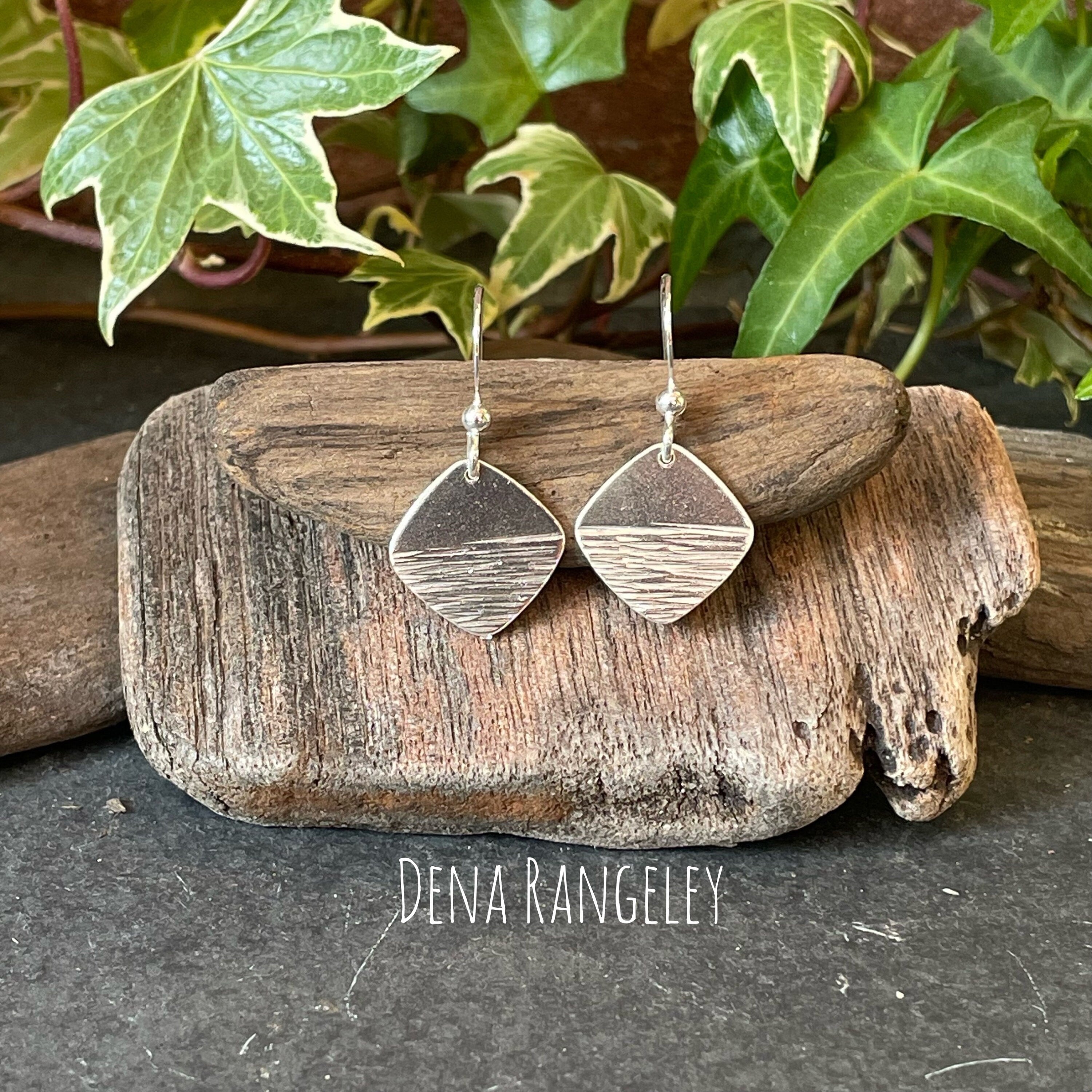 Sterling silver textured earrings.