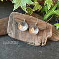 Sterling silver textured earrings.