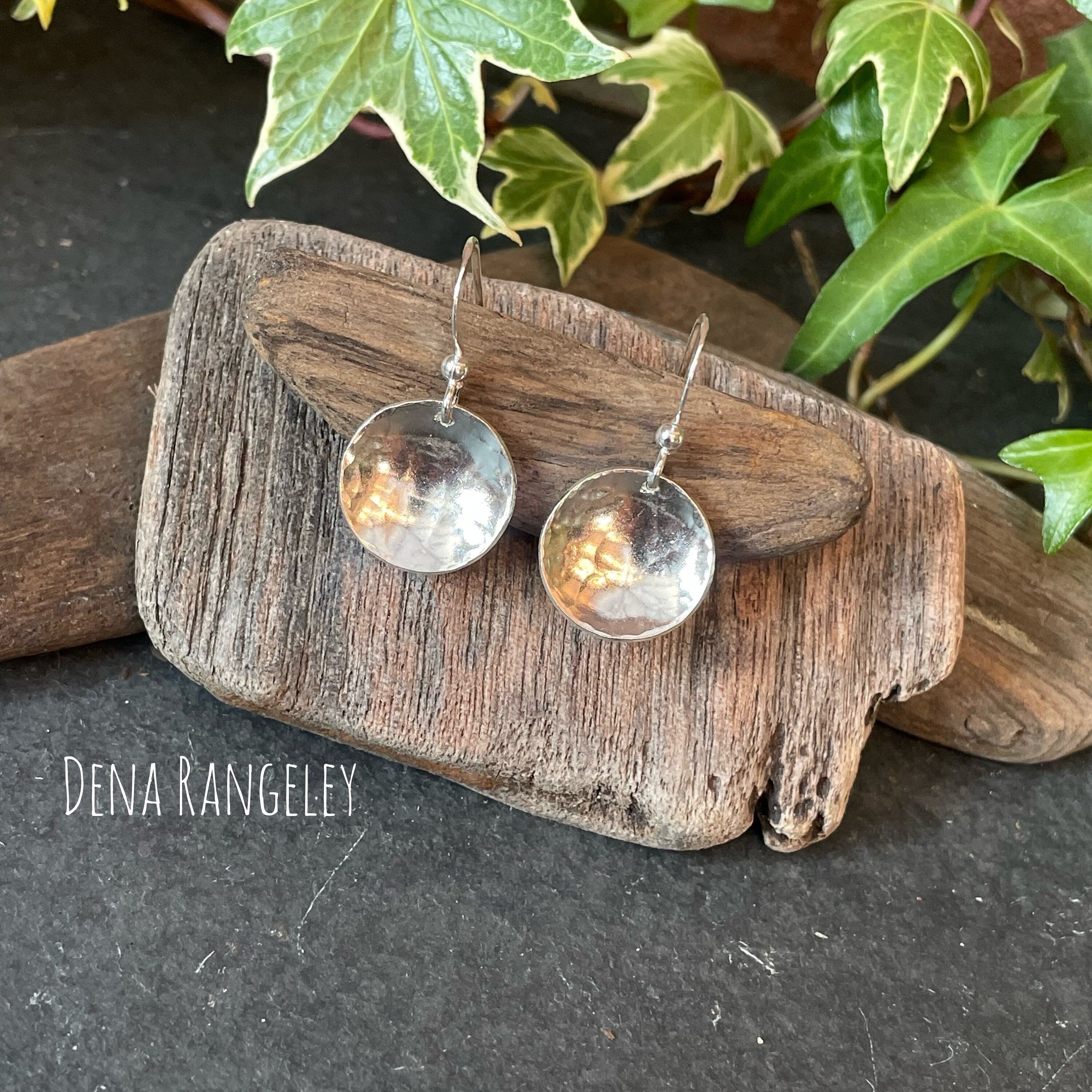 Sterling silver textured earrings.